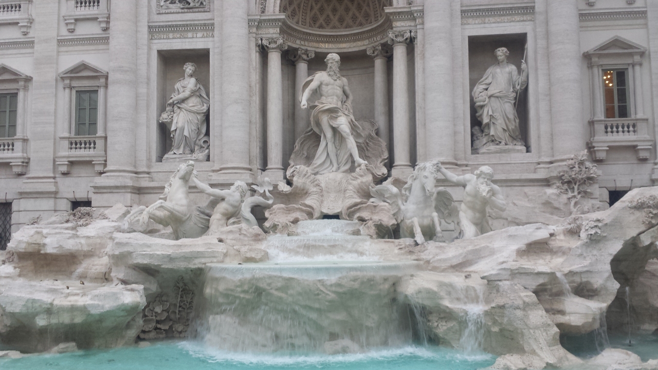 The famous Trevi Fountain showcasing intricate sculptures.