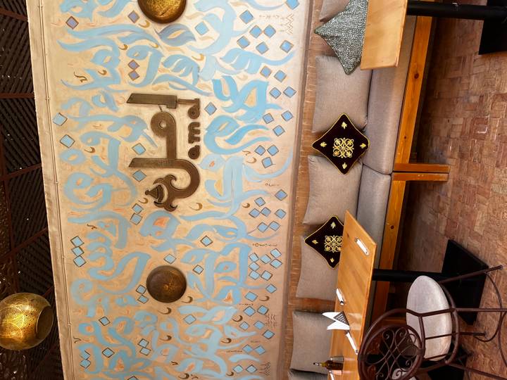 Indoor café scene with traditional decor and seating.