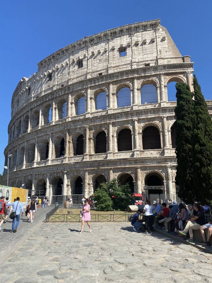 The Colosseum with visitors on the grounds.