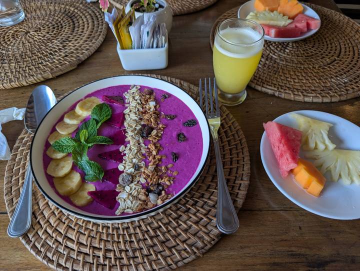 Breakfast bowl with fruit and granola.