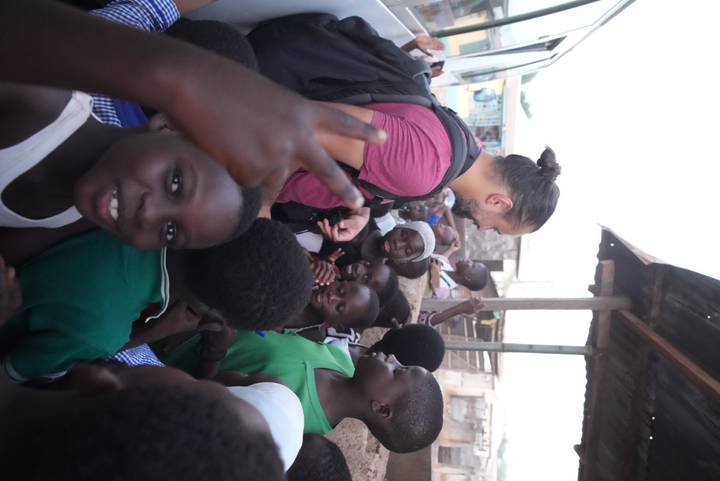 Group of people interacting in an outdoor setting.