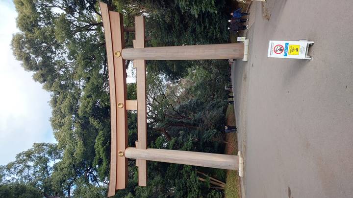 Large torii gate at Meiji Shrine entrance.