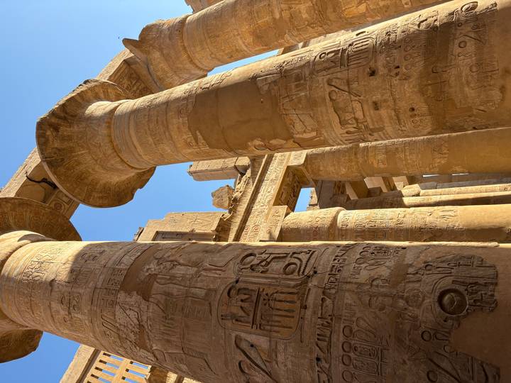 Massive stone columns with Egyptian hieroglyphs.