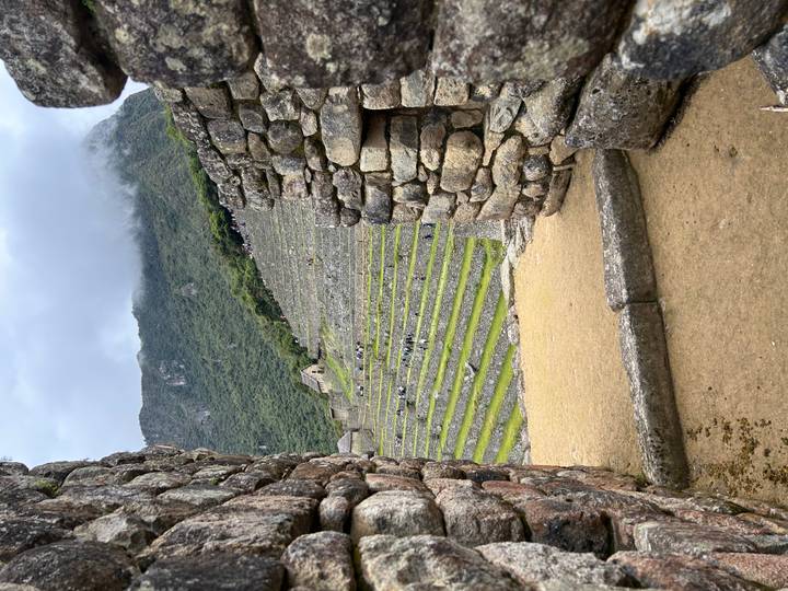 Ruins of Machu Picchu with mountainous backdrop.