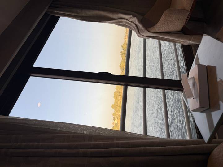 Scenic view from a window showing a river.