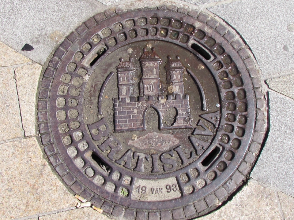 Bratislava manhole cover with castle design.