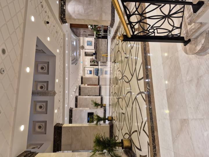 Elegant hotel lobby with a decorative floor.