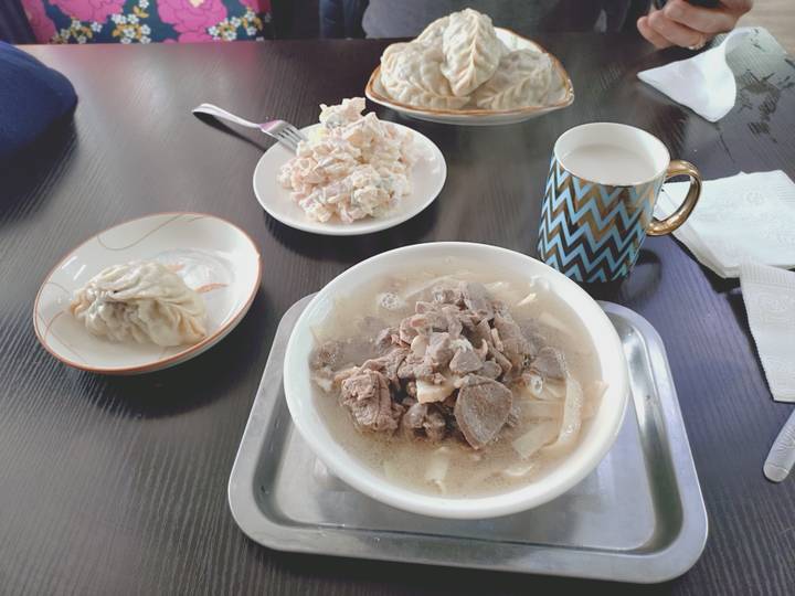 Traditional meal with meat stew and dumplings.