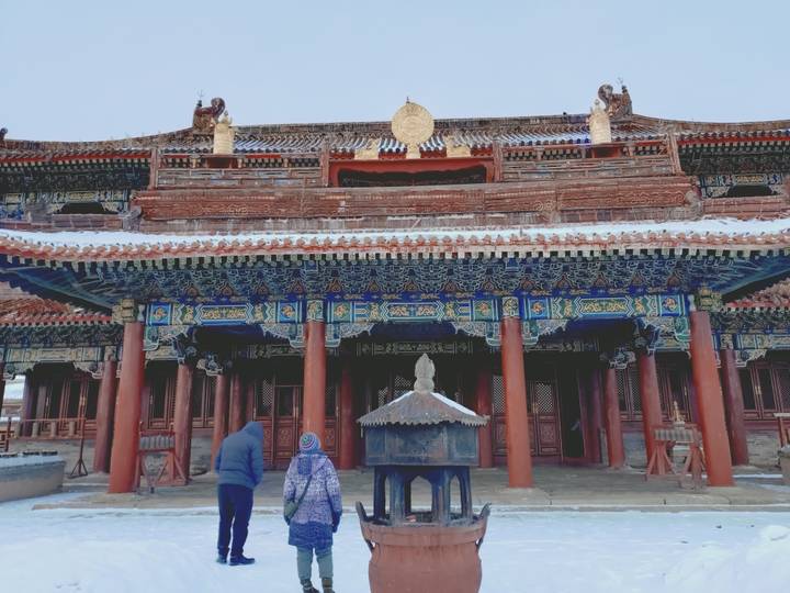 Traditional temple with intricate architecture in winter.