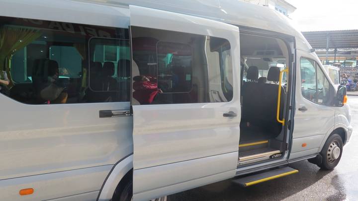Open door of a passenger van.