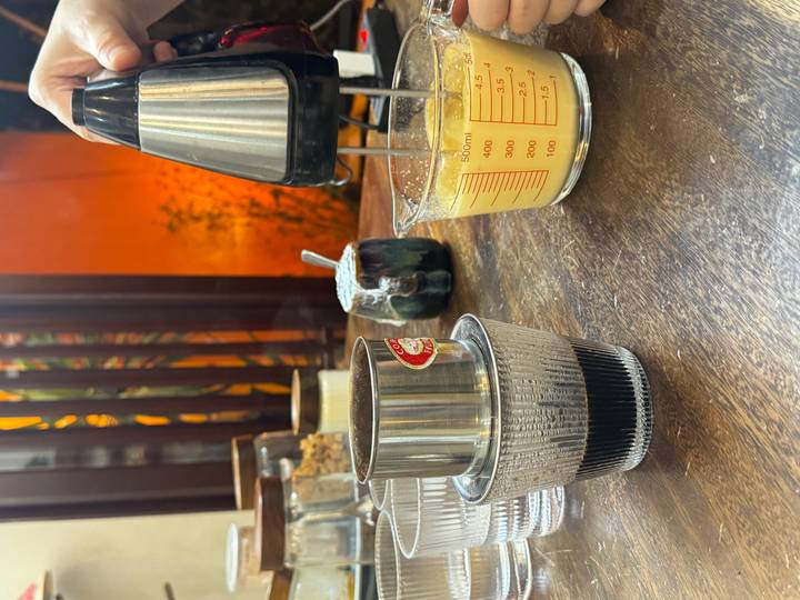 Duplicate third close-up of Vietnamese drip coffee and egg mixture.