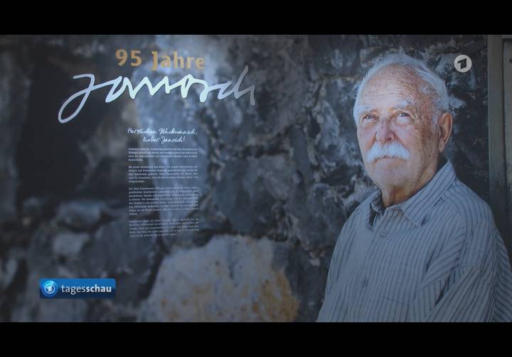 Television news still with portrait of elderly man and German text overlay, visible TV channel logo.