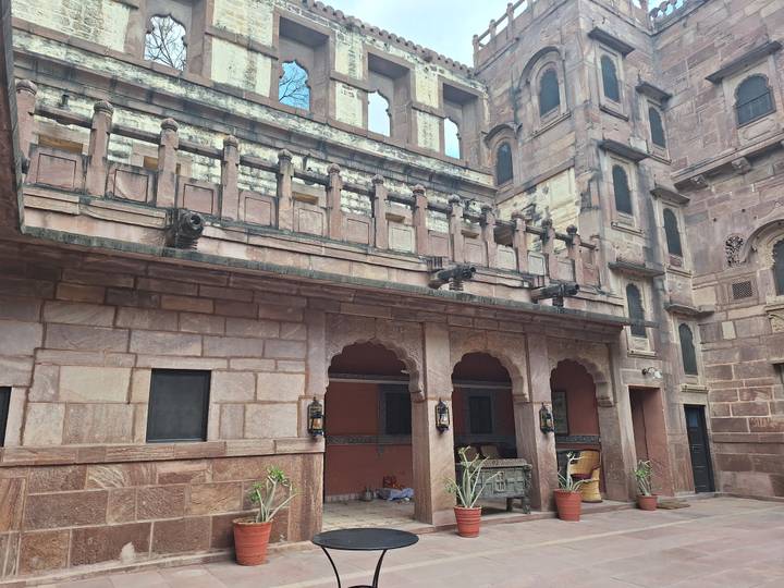 Close-up of historic sandstone haveli courtyard with carved balconies in Jodhpur
