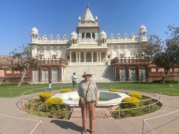 Traveller stands before the ornate marble cenotaph of Jaswant Thada in Jodhpur