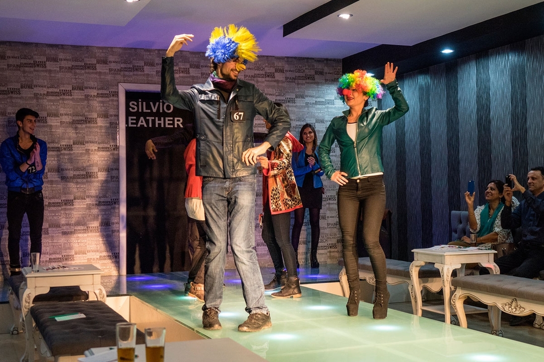Models taking a bow at the end of a fashion show.
