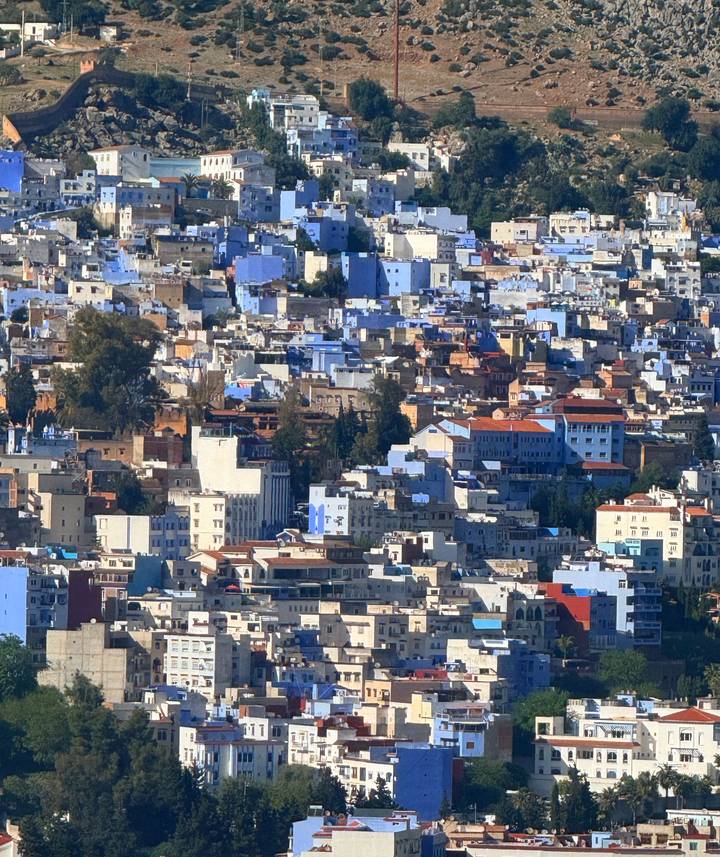 Panoramic view of Chefchaouen’s blue-painted houses cascading down the hillside