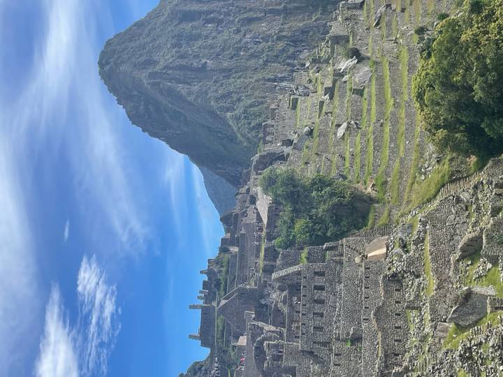 Iconic terraces and steep cliffs of Machu Picchu bathed in gentle light