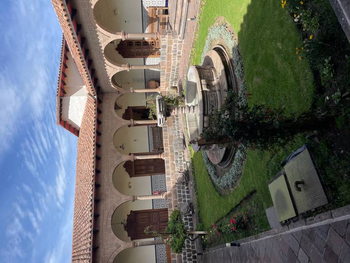 Stone fountain in a tranquil cloistered courtyard of a colonial building