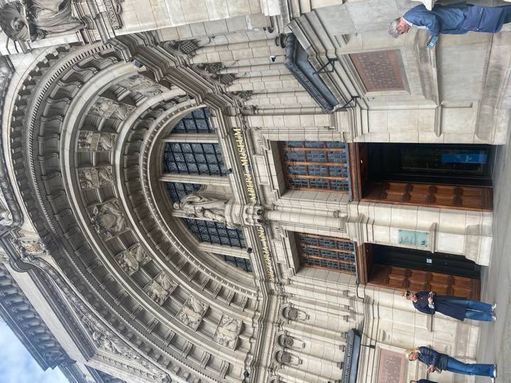 Grand arched entrance of the Victoria and Albert Museum in London.