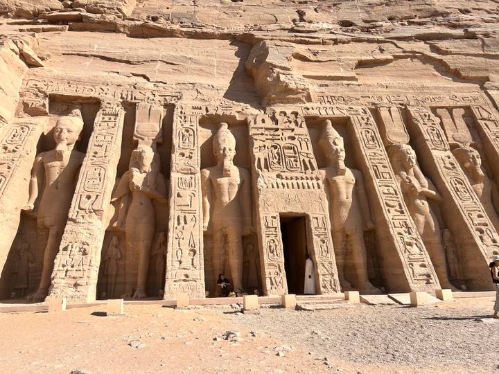Facade of the Temple of Hathor at Abu Simbel with monumental standing statues between pillars