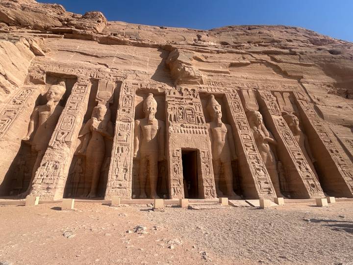The rock-cut Temple of Nefertari at Abu Simbel features colossal standing figures and intricate carvings.