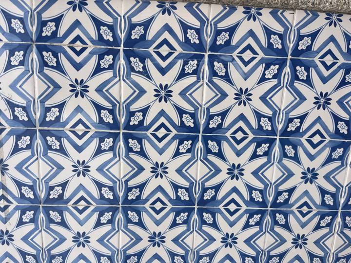 Close-up pattern of traditional blue and white Portuguese ceramic tiles