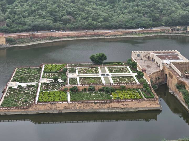 Symmetrical Mughal garden island in Maota Lake viewed from Amber Fort ramparts.
