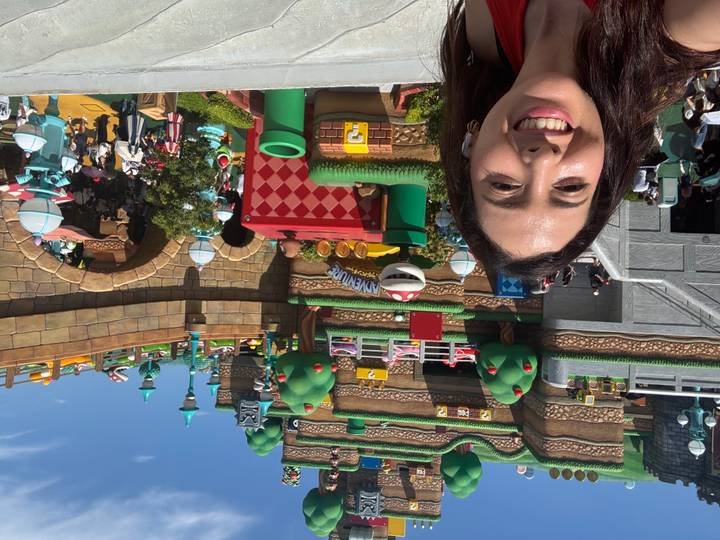 Selfie amid vibrant Super Nintendo World attractions at Universal Studios Japan.