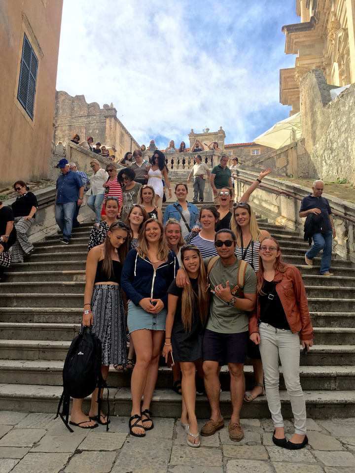 Group on steps in a city environment.