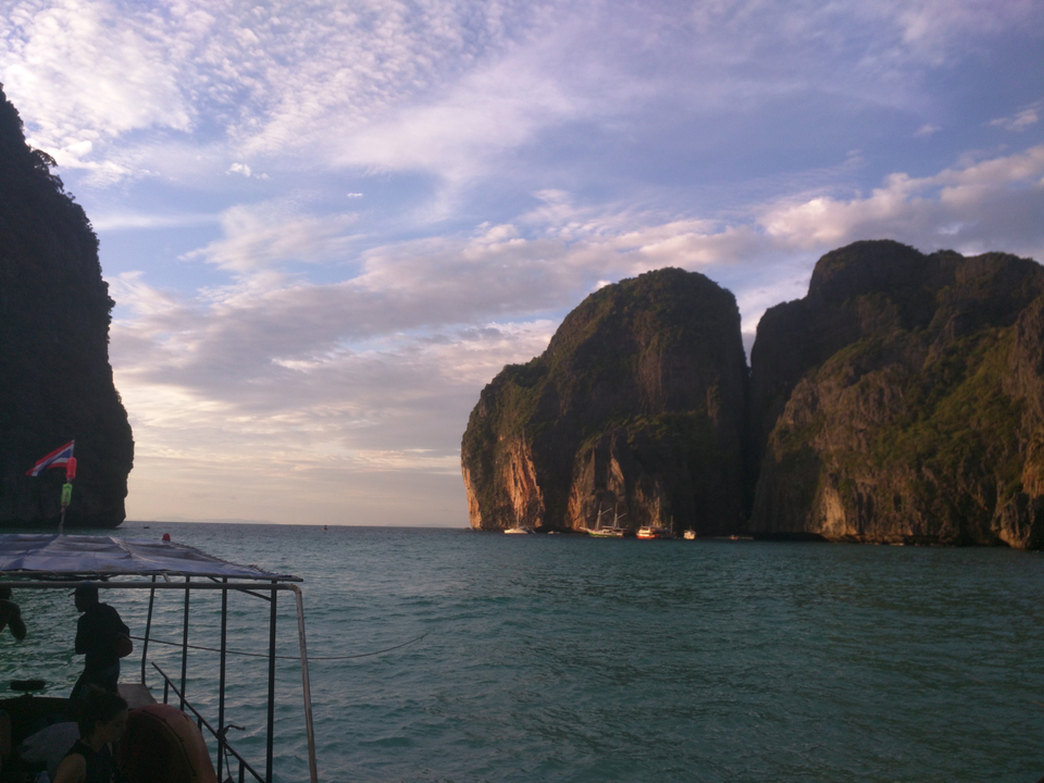 Scenic ocean view with large rock formations.
