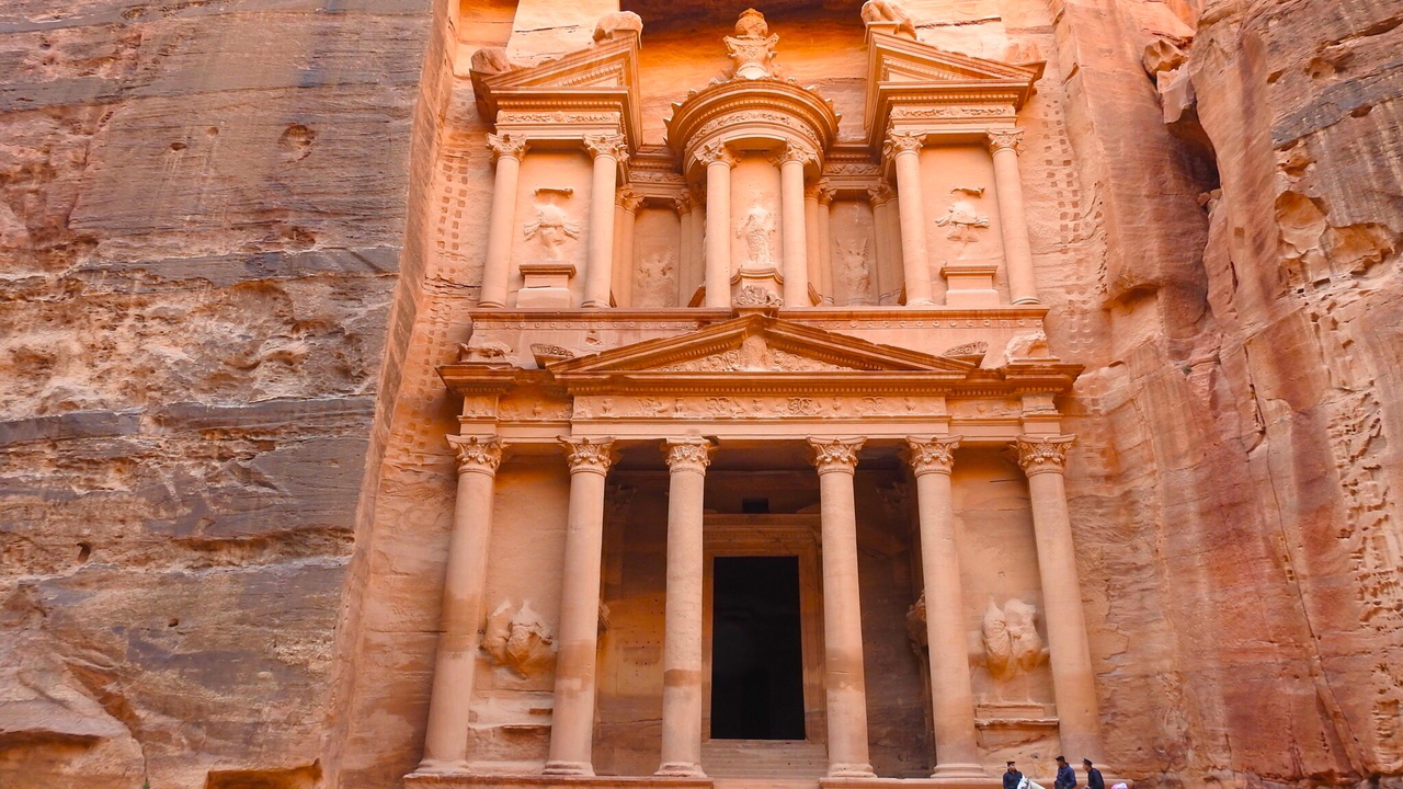 The Treasury at Petra carved into the cliff.