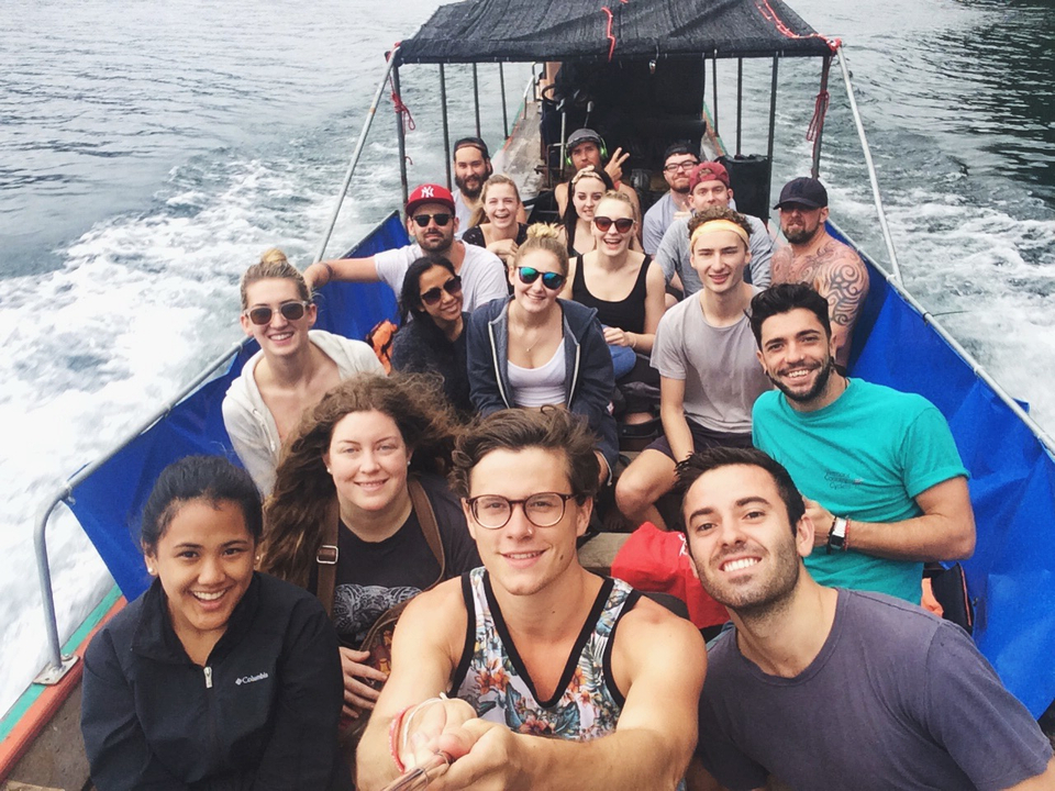 Group of people taking a selfie on a boat
