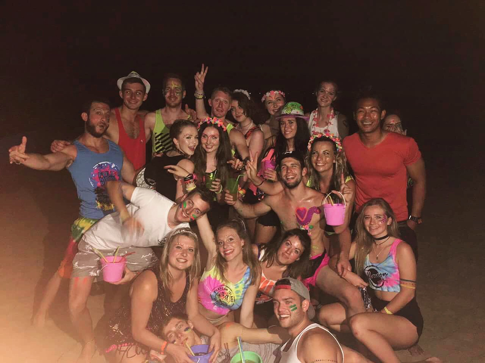 Group of people having a party at night.