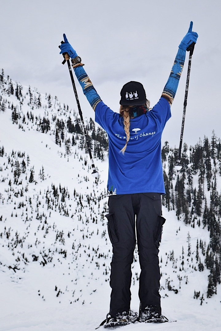Person skiing in a snowy mountainous area