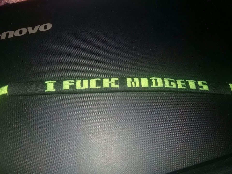 A close-up of text on a dark surface.