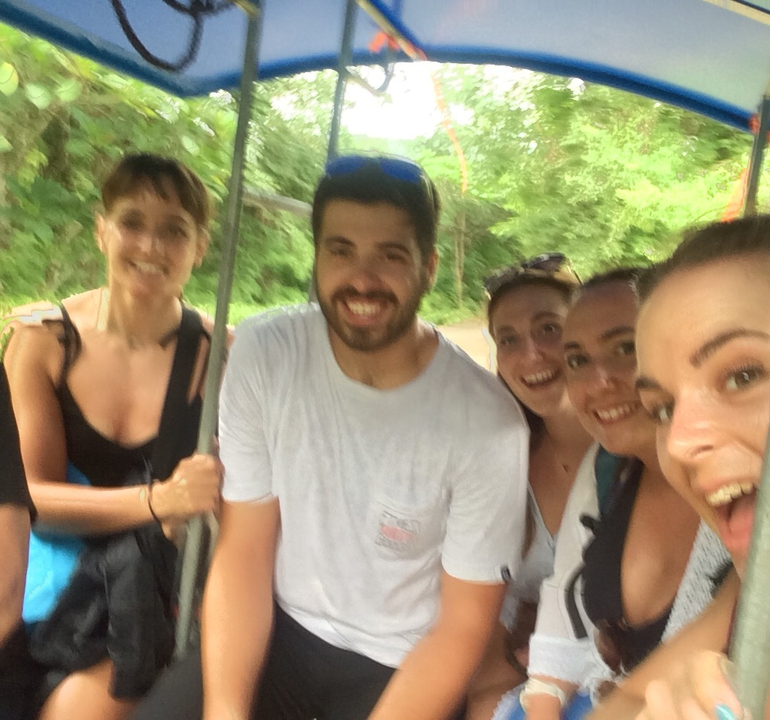 Blurry close-up photo of people smiling.