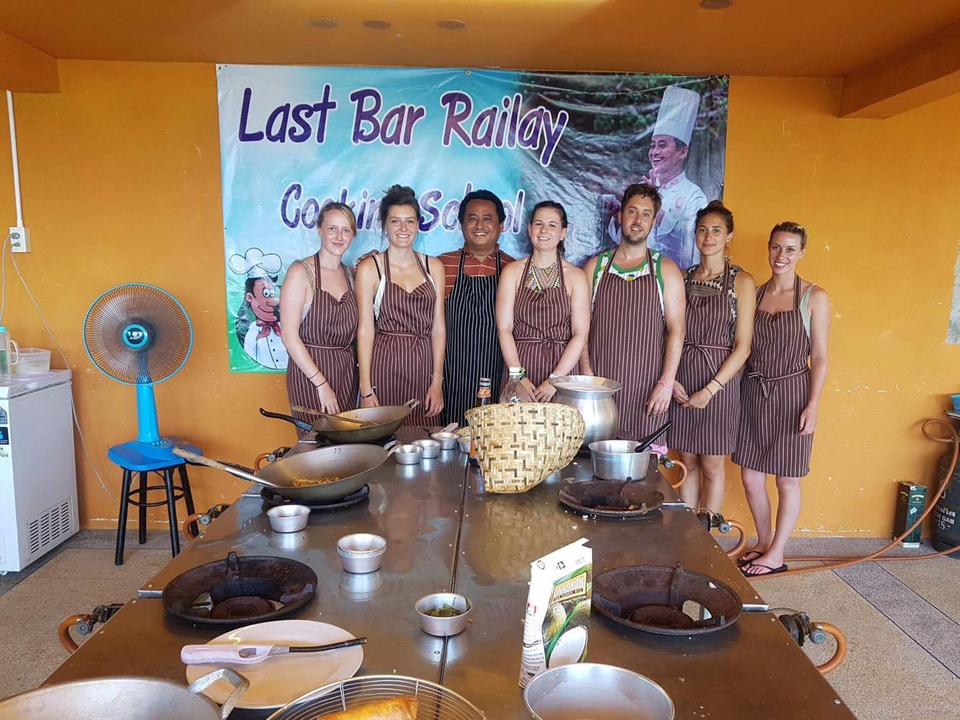 Group of people in a cooking class setting.