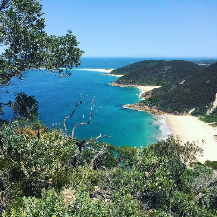 Coastal view with beaches and lush vegetation