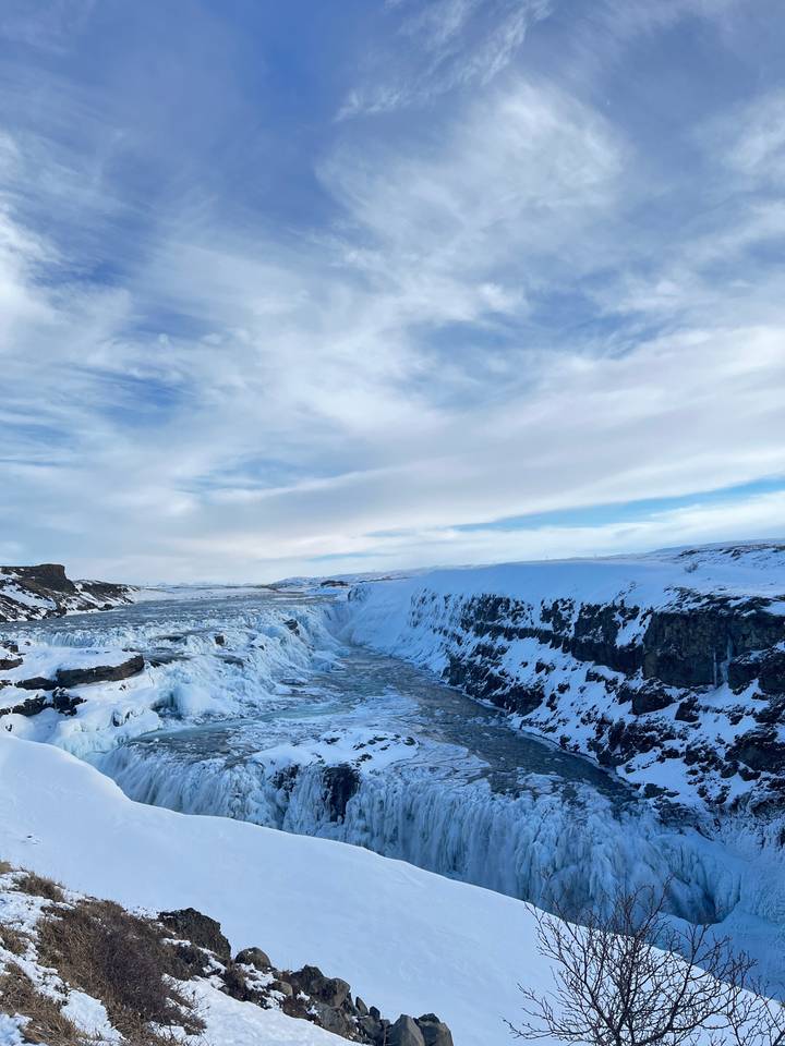 Snowy mountain landscape with clear sky.