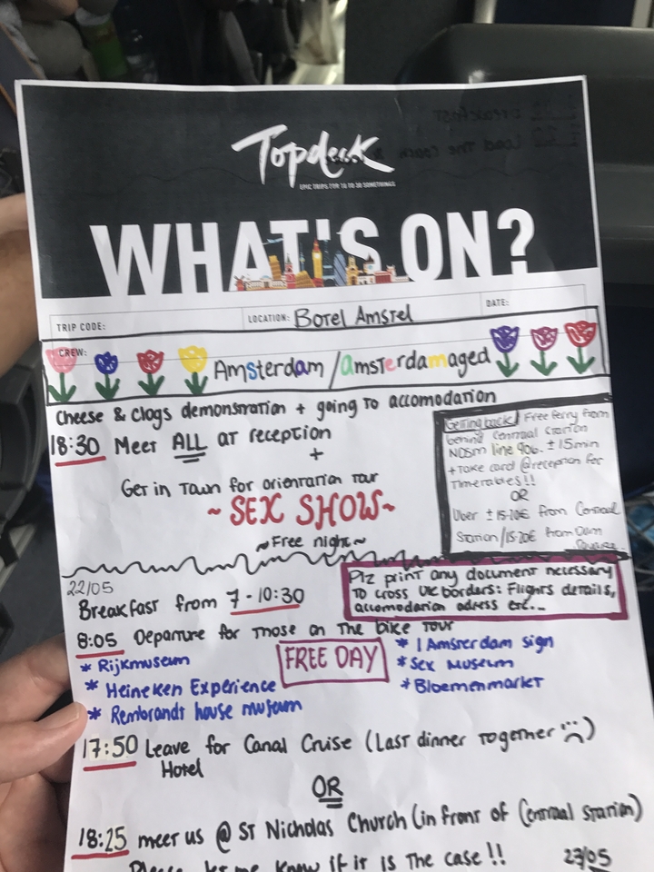 Close-up of a printed itinerary with text.