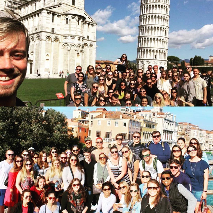 Large group of people in front of famous landmarks.