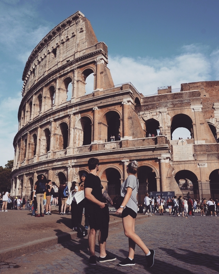 People in front of the Colosseum in Rome.