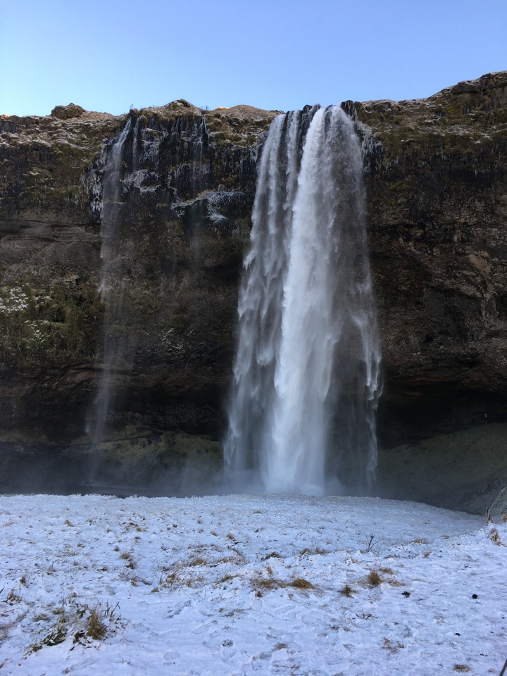 Majestic waterfall cascading down a cliff.