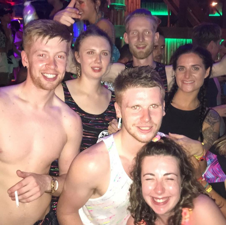 Crowded group photo indoors.