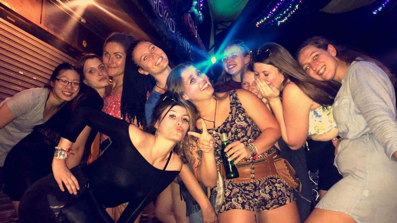 Group of people having fun in an indoor setting.