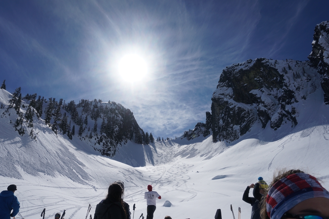 Sunlit snowy landscape with clear skies.