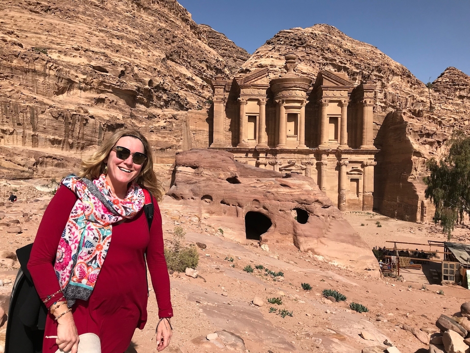 Person in front of the Al-Khazneh (The Treasury) in Petra.