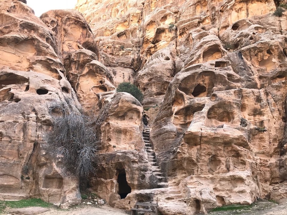 Rocky landscape with steps carved into a hill.