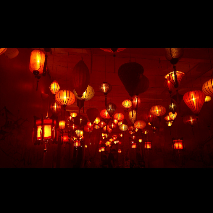 Room filled with various hanging lanterns