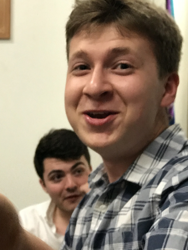 Close-up of two people indoors.